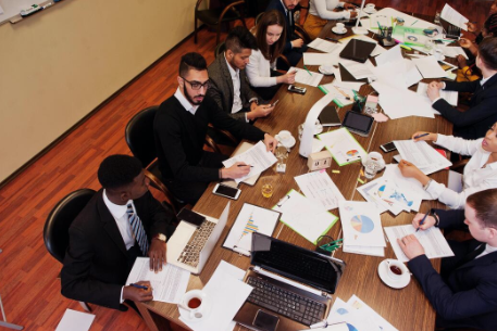 Colleagues meeting around a conference table